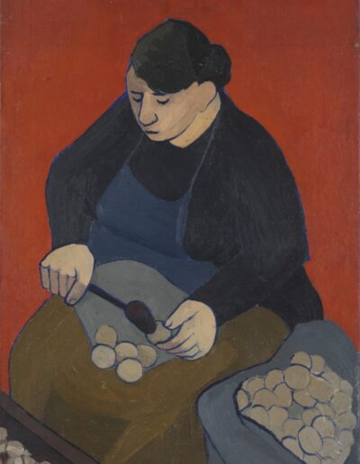 Woman cracking walnuts with a hammer c. 1949